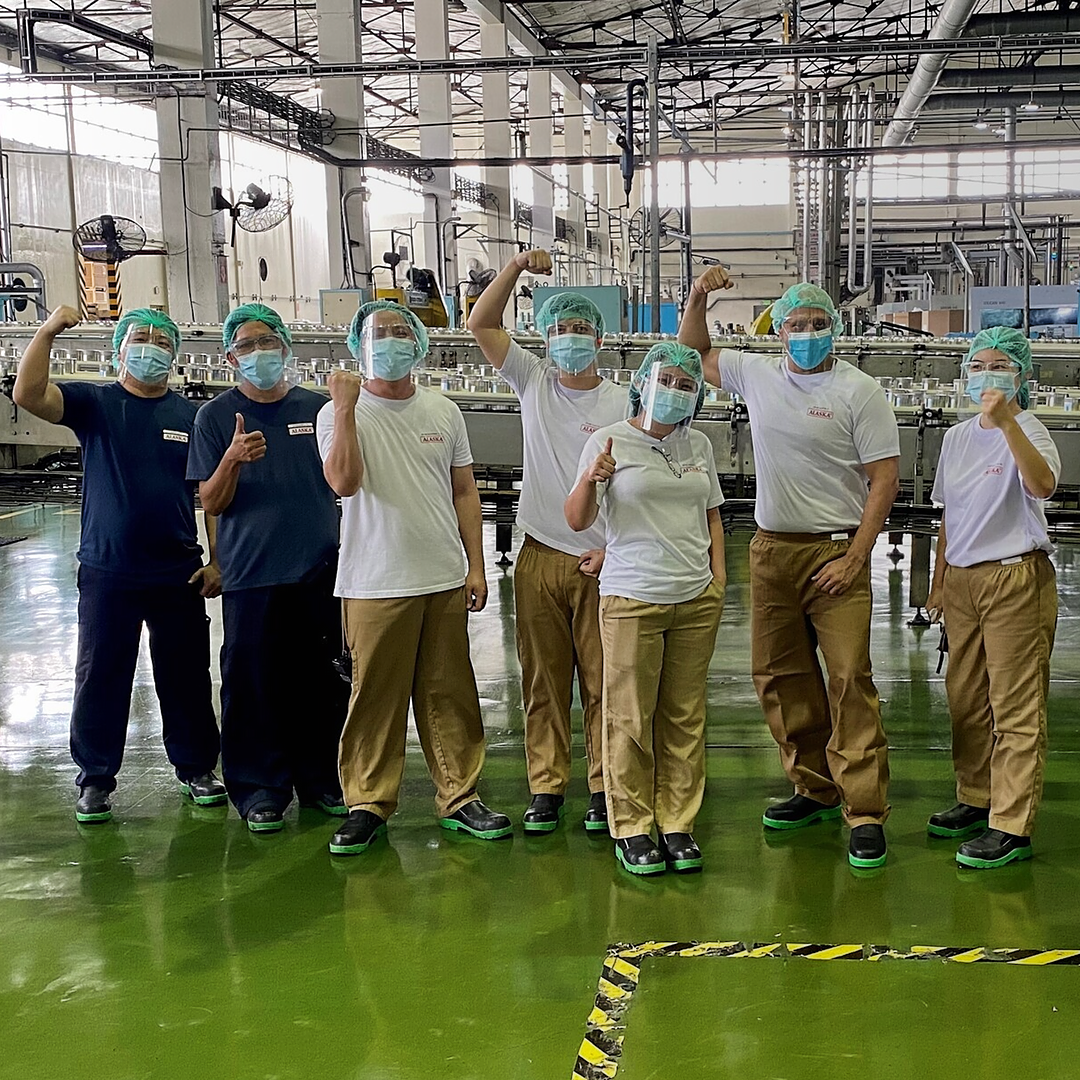 Marietta and colleagues in the factory